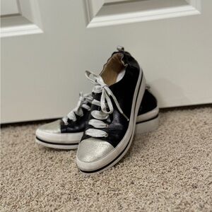 Dressy athletic shoe with a little bling. Nova metallic leather wedge.